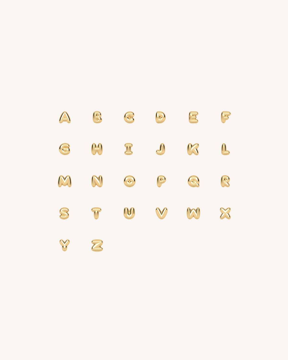 Set of puffed gold tone letter charms, assorted initials on display