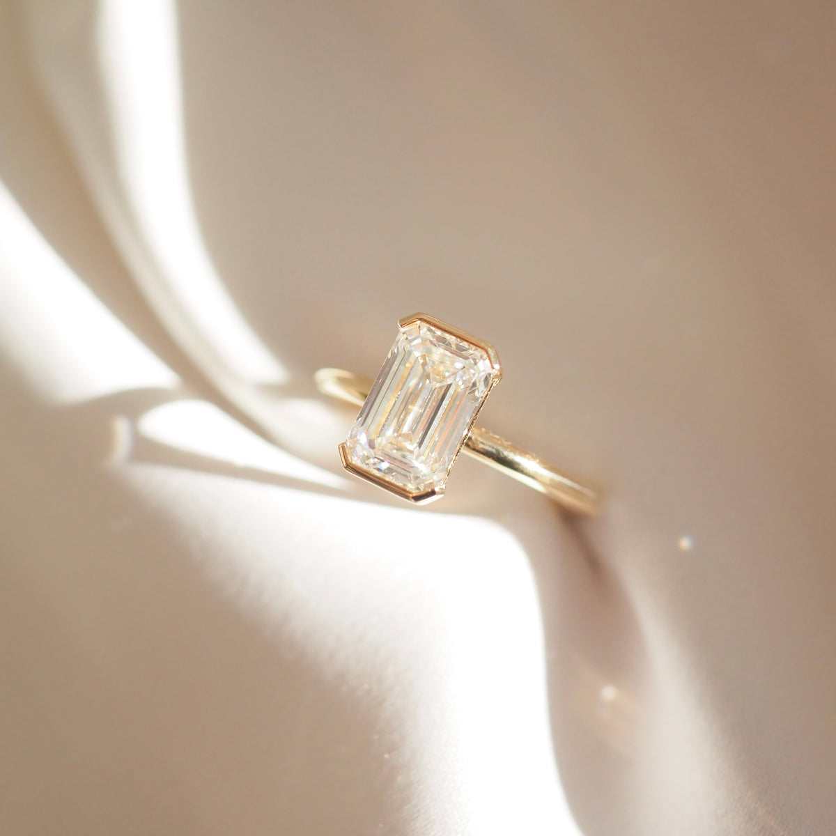 Evie | Emerald Half Bezel Lab-Grown Diamond Engagement Ring