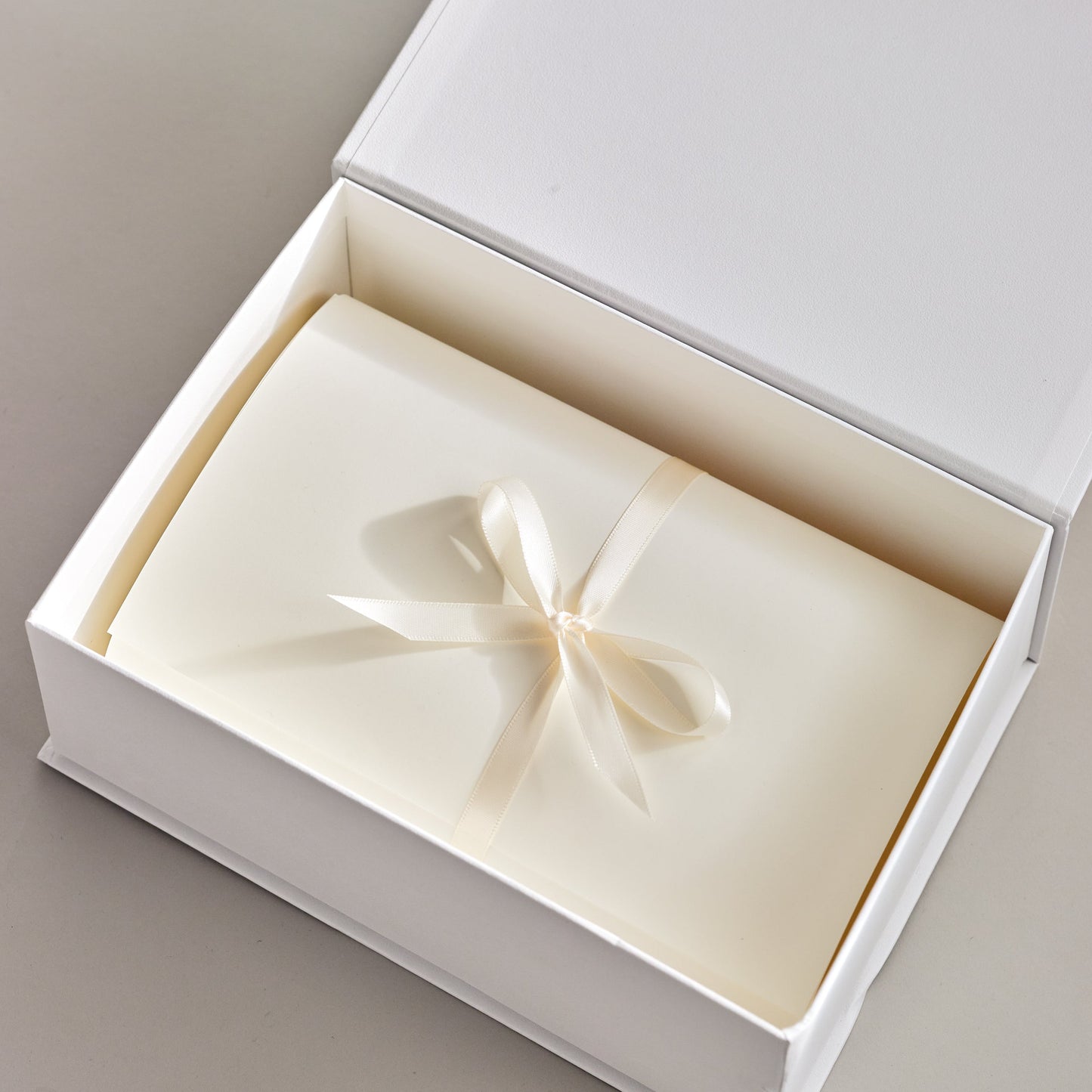 A box beautifully gift wrapped with a ribbon