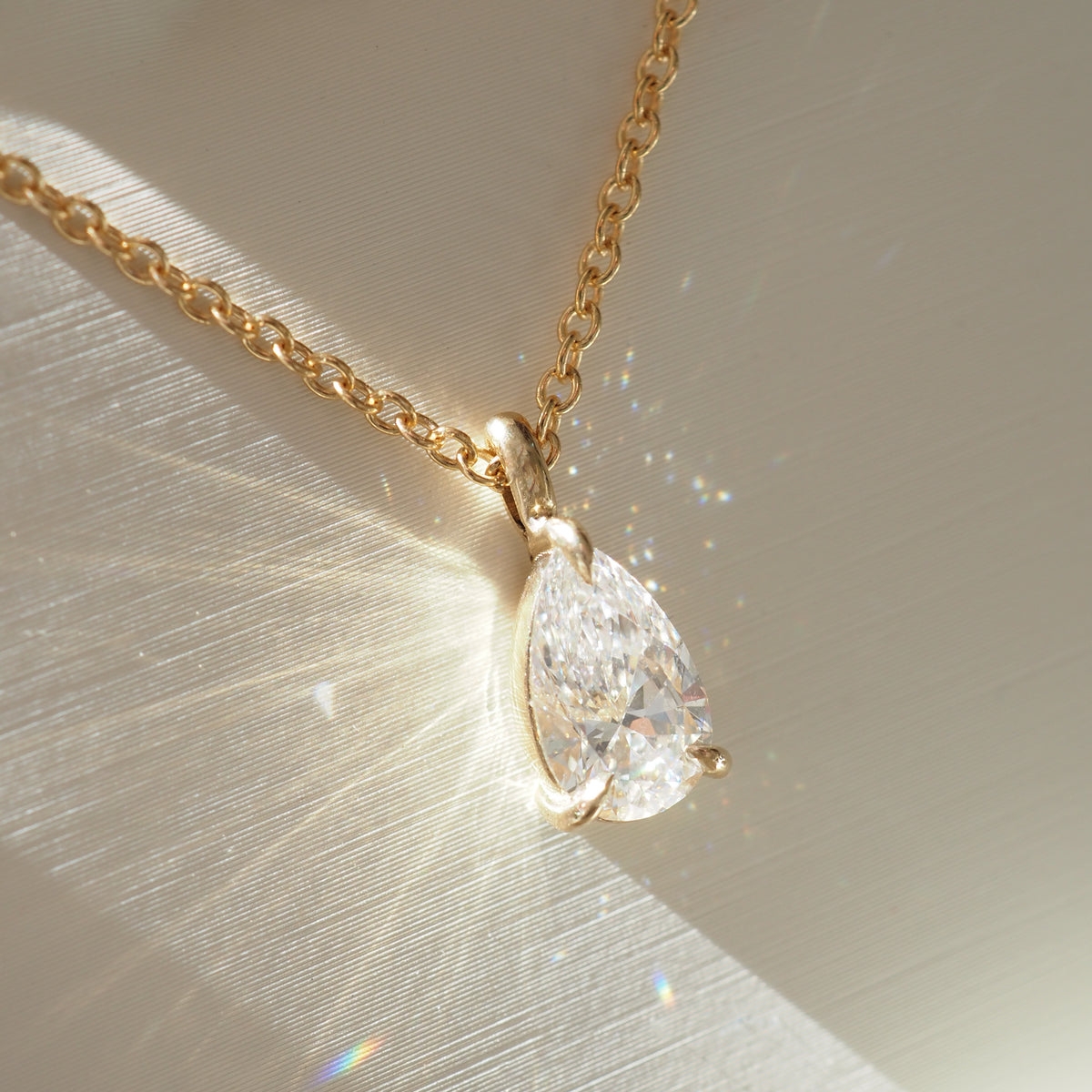 Pear Diamond Pendant on Yellow Gold Chain