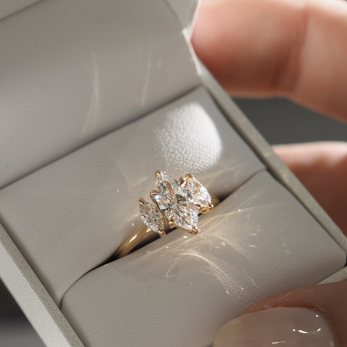 Maya is a modern treasure piece — celebrating the unique elongated cut of a marquise lab-grown diamond, held atop our signature sweep band. Solid 18ct yellow gold.