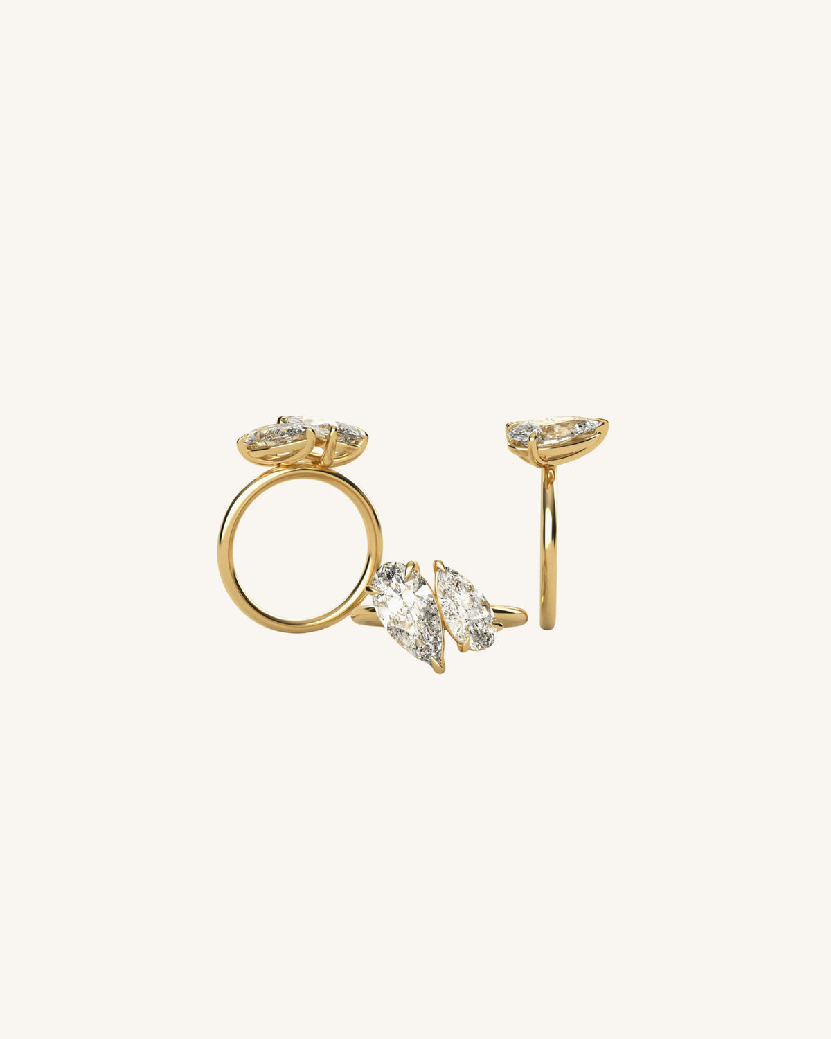 Elongated Pear Diamond Ring on a beige background