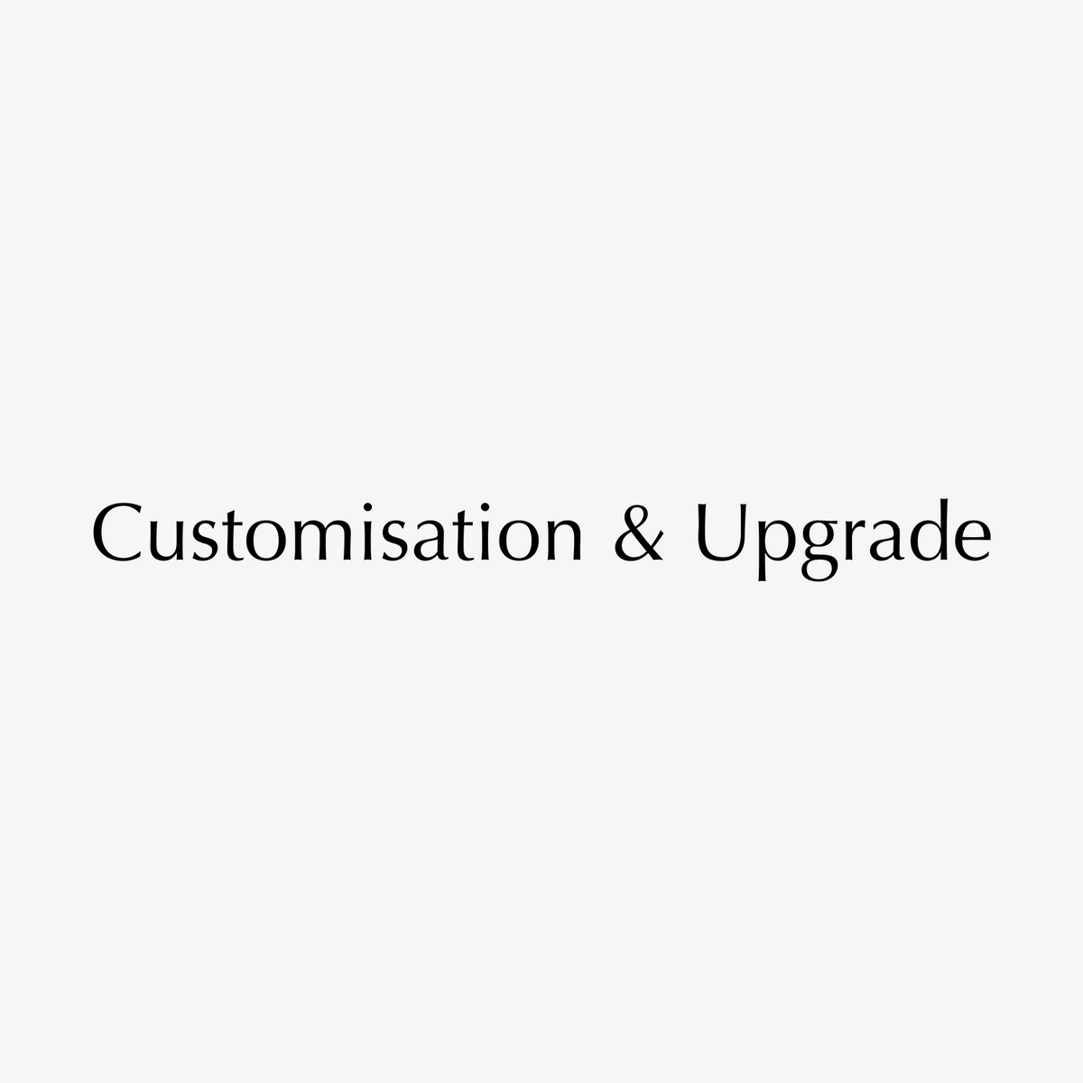 Text reading "Customisation & Upgrade" in black on a light grey background, suggesting luxury jewellery personalisation and enhancement services.